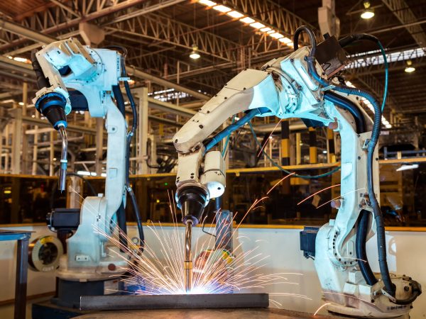 Industrial,Robots,Are,Welding,Automotive,Part,In,Car,Factory